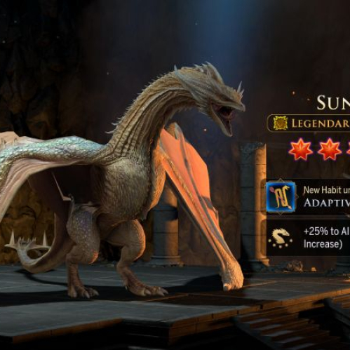 Captura de pantalla de la interfaz del videojuego móvil Game of Thrones: Dragonfire mostrando al dragón Sunfyre. La criatura legendaria de escamas doradas y membranas alares claras se encuentra sobre una plataforma de piedra dentro de una cueva o incubadora iluminada tenuemente. En la parte derecha de la pantalla se observa la ficha del personaje que indica su nombre "SUNFYRE", la rareza "LEGENDARY", la clase "SENTINEL", cinco estrellas rojas de mejora, el texto "Star Up!" y el desbloqueo de la habilidad pasiva "Adaptive Glory" que otorga un +25% a todas las estadísticas.