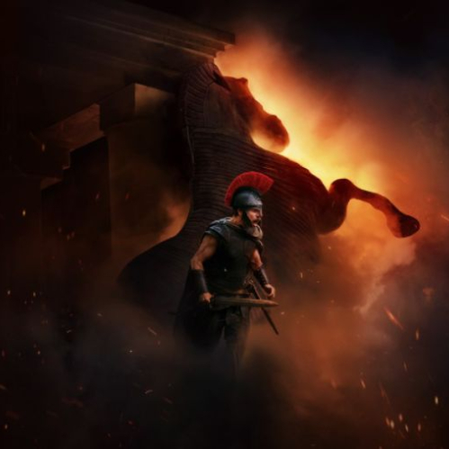 Póster promocional sobre fondo oscuro que muestra en la parte superior el logotipo de 'Funciones Incluyentes FUNDACIÓN CINÉPOLIS'. Al centro destaca el título 'LA ODISEA' junto al nombre del director Christopher Nolan y la frase '¡LLEGA EN FUNCIONES RELAJADAS!'. En la ilustración central se aprecia a un guerrero armado frente a la silueta del Caballo de Troya entre llamas, mientras en la base se indican las vías de compra de boletos y el logo de Universal Pictures.