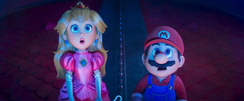 Mario y Peach observan sorprendidos algo fuera de cuadro en un entorno oscuro con piso de baldosas rojas y una estructura metálica al fondo.