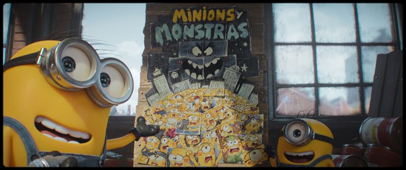 Minions & Monstruos — Presentación del proyecto Tres Minions frente a un cartel con un monstruo oscuro y estética de cómic.