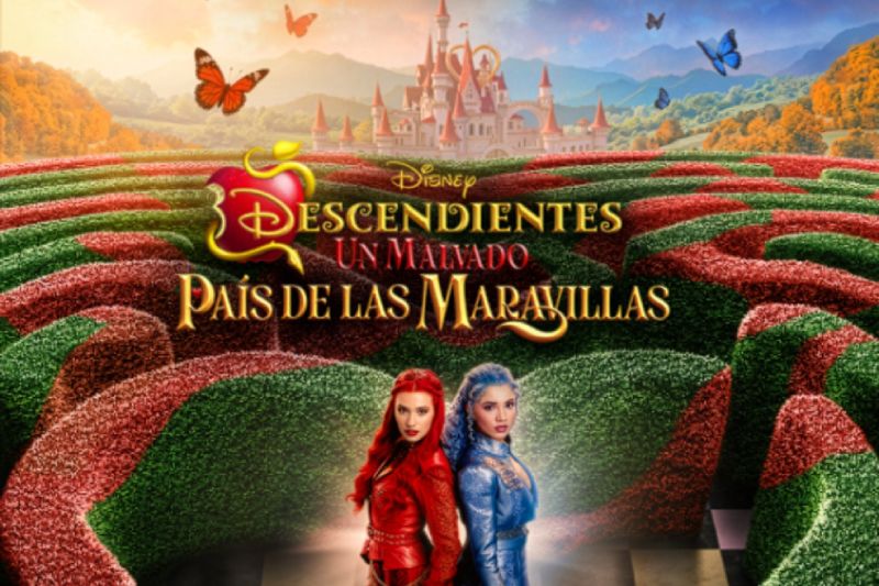 Dos personajes posan frente a un laberinto colorido con un castillo al fondo en un entorno fantástico.