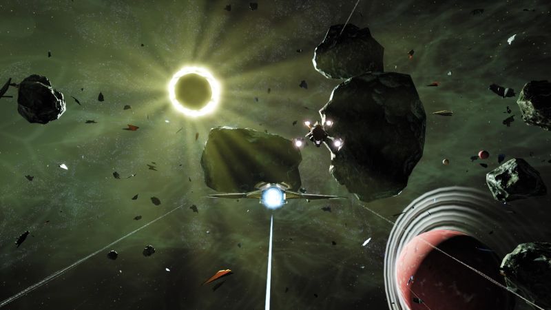 Exploración espacial frente a un eclipse solar en Rogue Eclipse Nave del jugador volando hacia un eclipse solar brillante rodeado de rocas espaciales y la órbita de un planeta rojo.