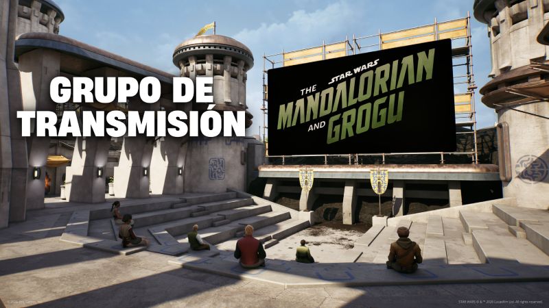 Personas reunidas en un espacio futurista al aire libre frente a una pantalla gigante con temática de Star Wars.